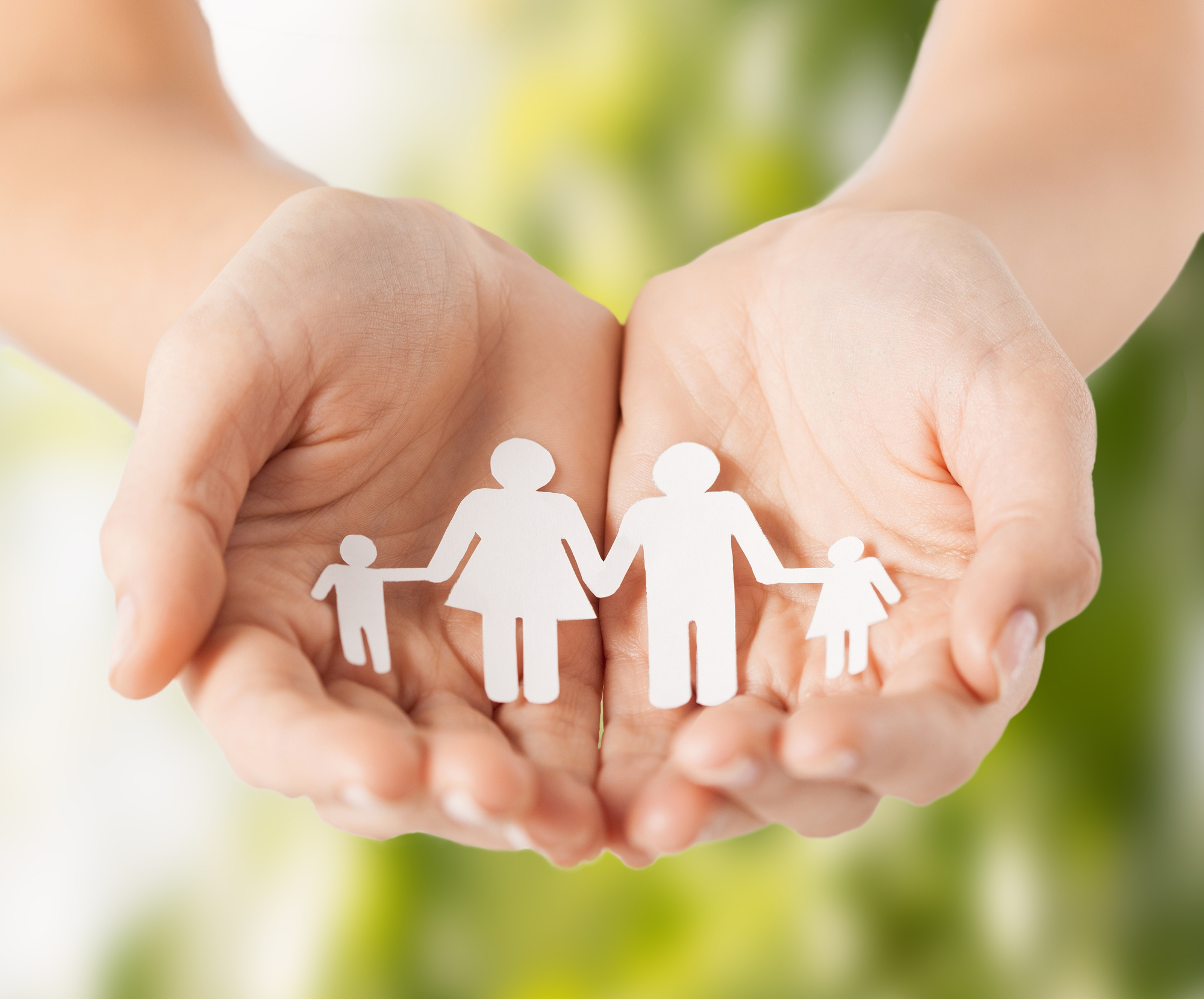 eco, bio, nature, love, harmony concept - woman cupped hands showing paper man family